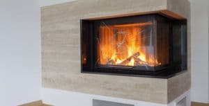 Modern fireplace featuring custom glass doors with tempered glass for safety and style