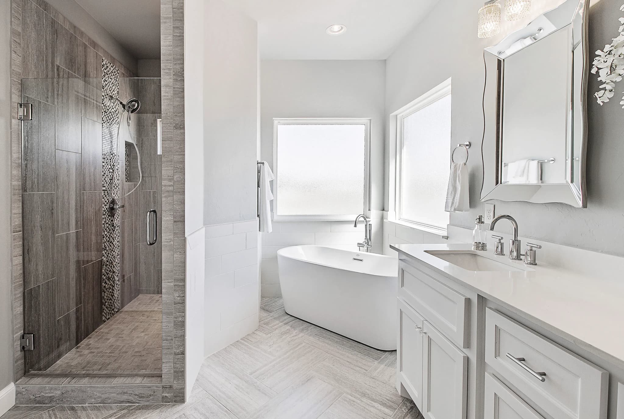 Stylish bathroom featuring custom shower doors