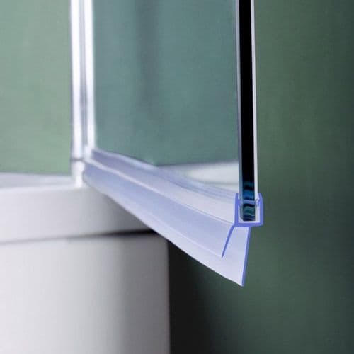 Close-up of a glass shower door seal, featuring custom glass design, ideal for shower doors and tempered glass applications.