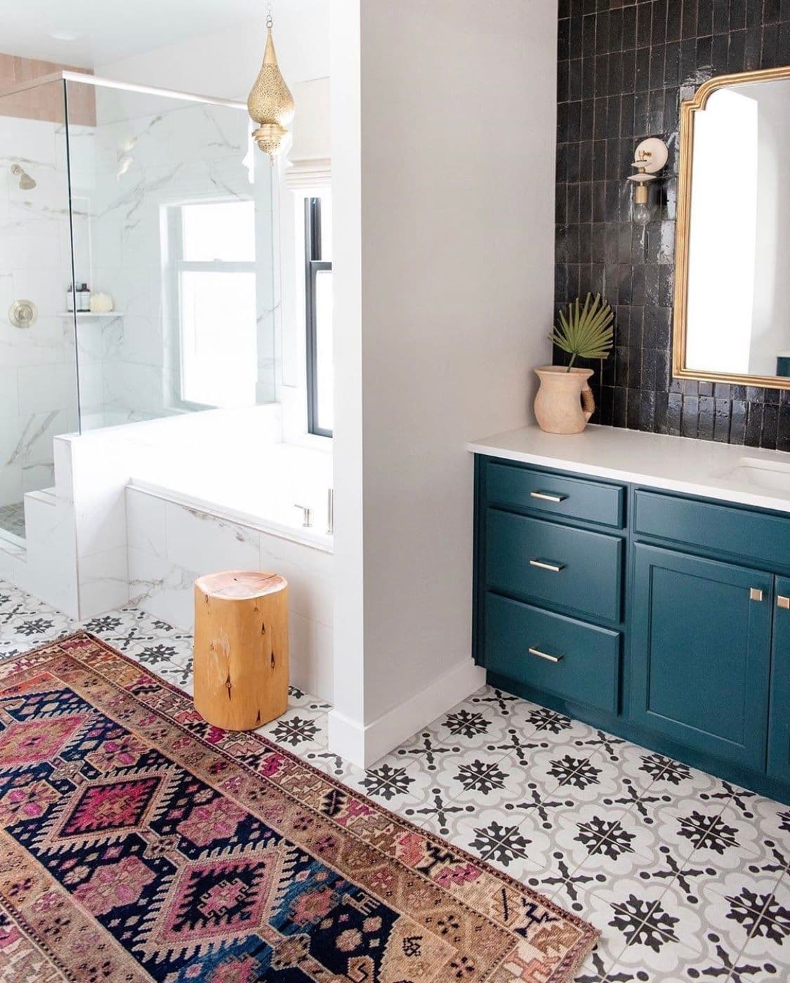 Modern bathroom featuring custom glass shower doors