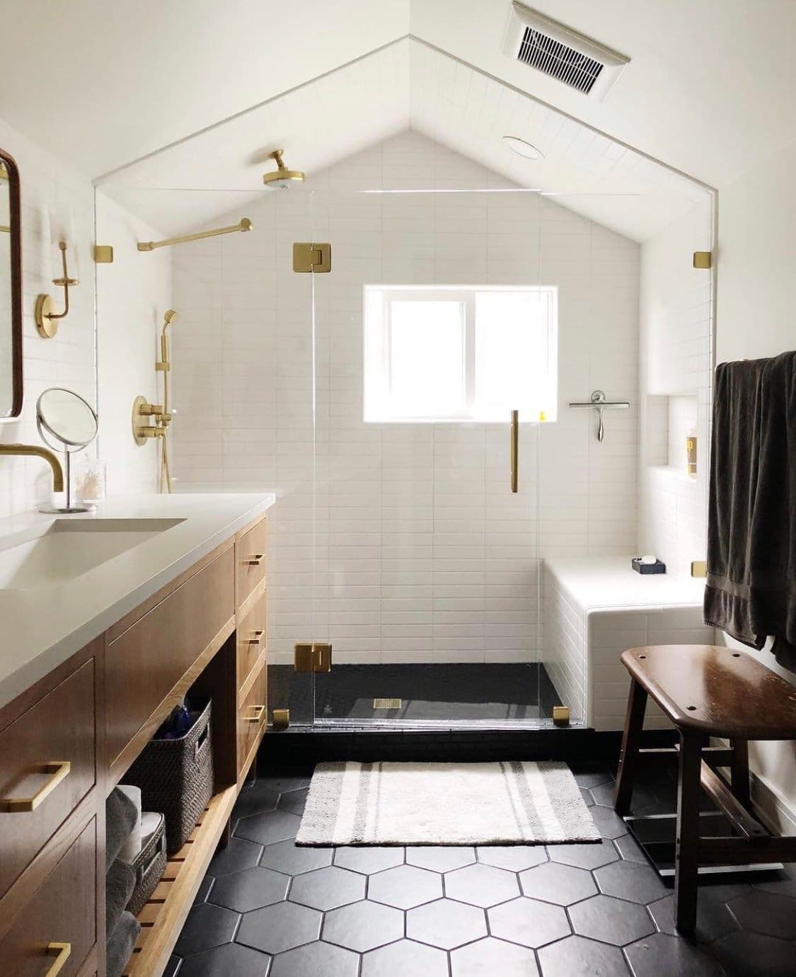 Modern bathroom featuring a stylish shower door made of tempered glass