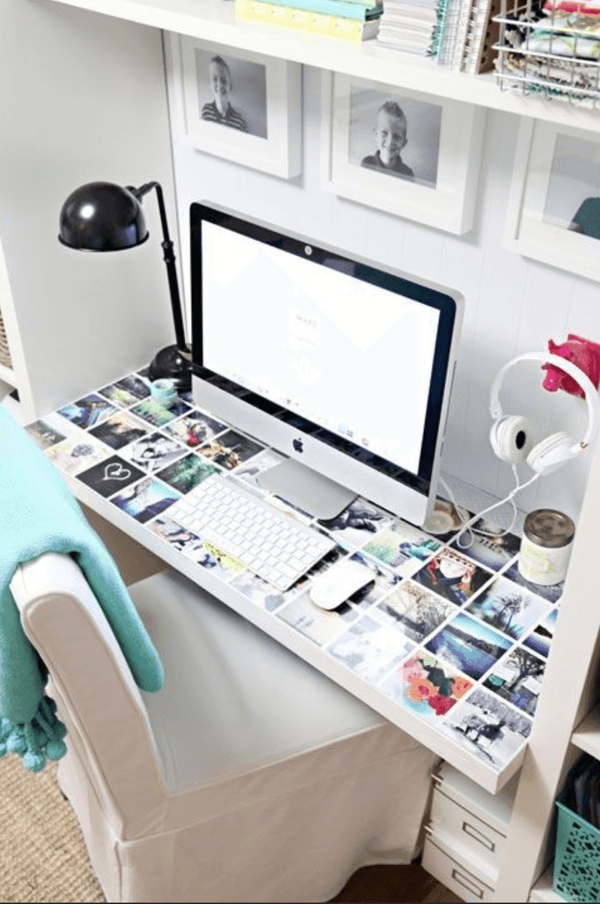 Custom glass desk surface decorated with photos