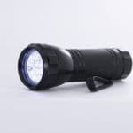 Black flashlight on a white background