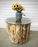 Custom glass tabletop on a rustic wooden base