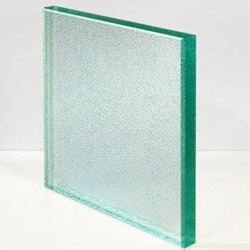Tempered glass panel with a textured surface