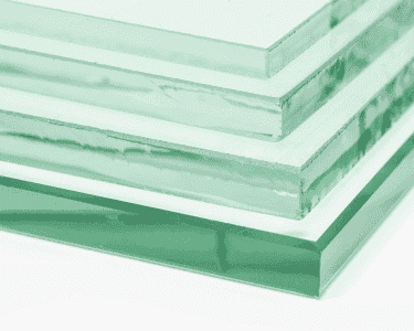 Tempered glass sheets showcasing beveled edges, ideal for custom shower doors, table tops, and mirrors.