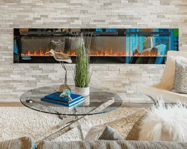 Modern living room featuring a sleek glass coffee table with a beveled glass edge, complemented by a stylish fireplace and decorative elements, showcasing custom glass design.