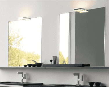 Custom mirrors with polished edges above modern sinks, showcasing tempered glass design suitable for elegant bathroom decor.