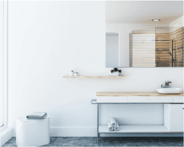 modern bathroom featuring custom mirrors, tempered glass shower doors, and stylish table tops with a minimalist design