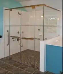 Custom glass shower doors featuring beveled edges and a modern design with tempered glass in a stylish bathroom setting.
