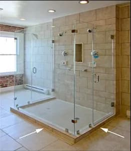 Custom glass shower doors with tempered glass panels and sleek design, enhancing modern bathroom aesthetics.