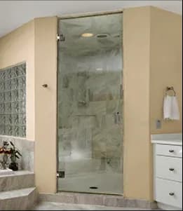 Custom glass shower doors with tempered glass in a modern bathroom setting, showcasing a sleek design and elegant finish.