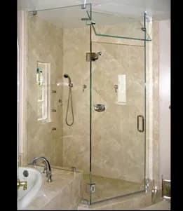 Custom glass shower doors with tempered glass, featuring a polished bevel edge in a modern bathroom design.