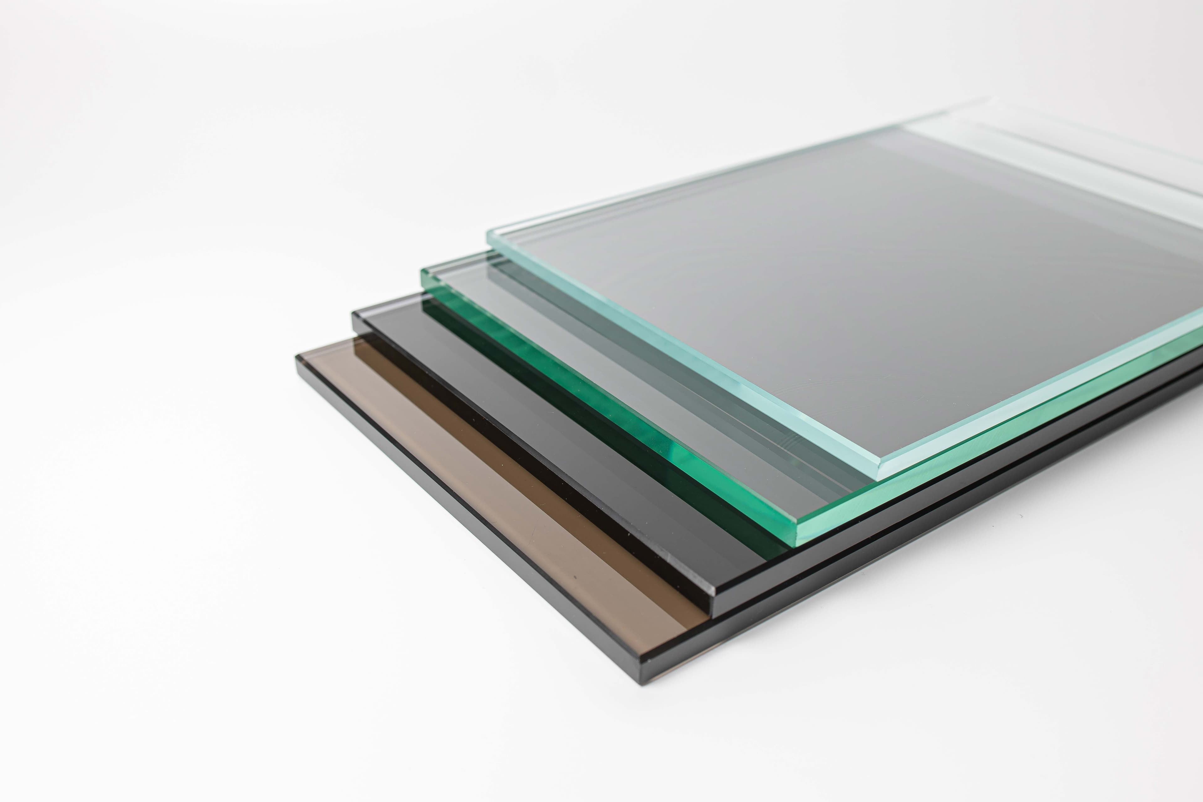Custom glass sheets featuring tempered glass and beveled glass edges, ideal for shower doors, table tops, and mirrors.