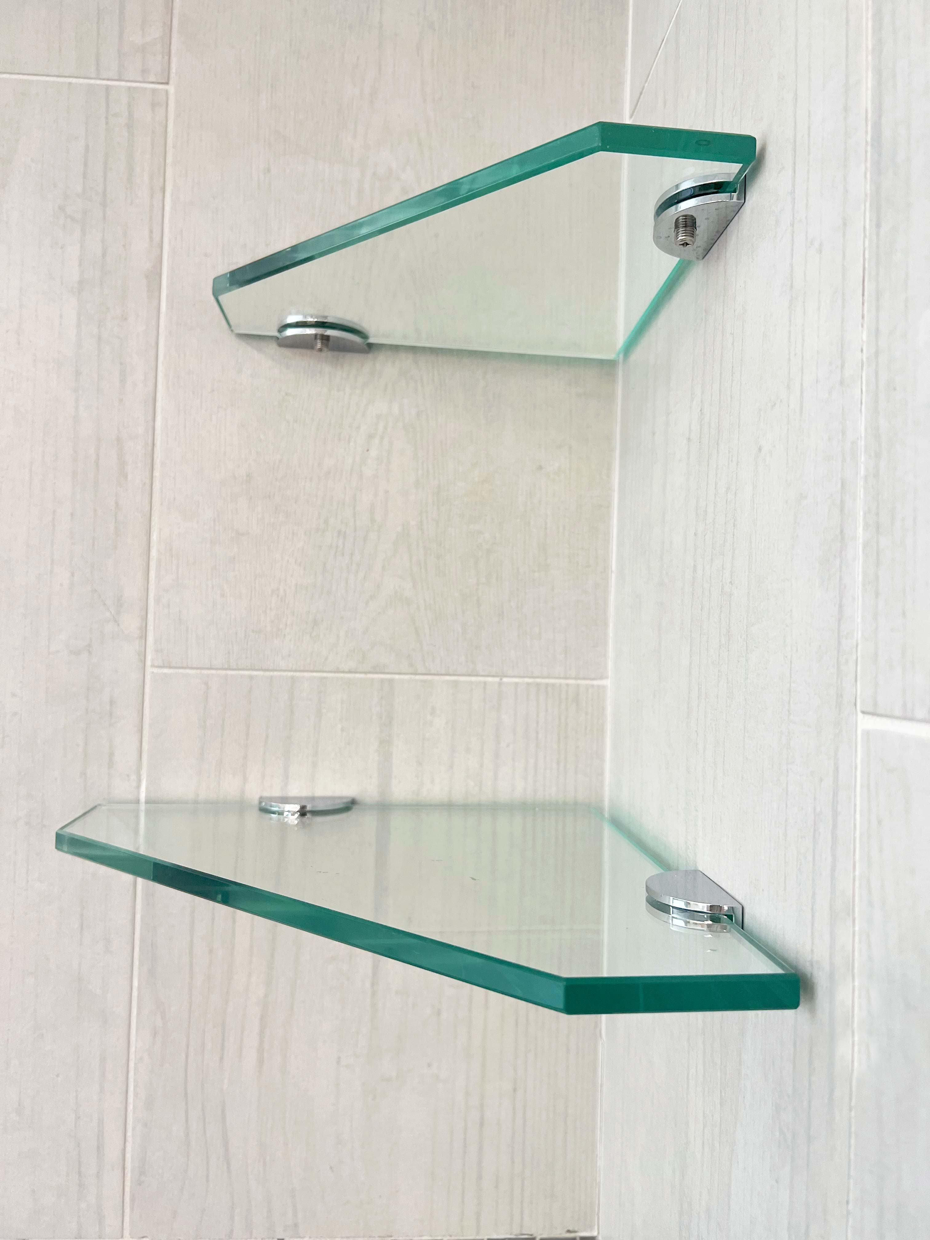 Custom glass shelves with tempered glass and beveled edges, mounted on chrome brackets, showcasing a modern design suitable for shower doors, table tops, and mirrors.
