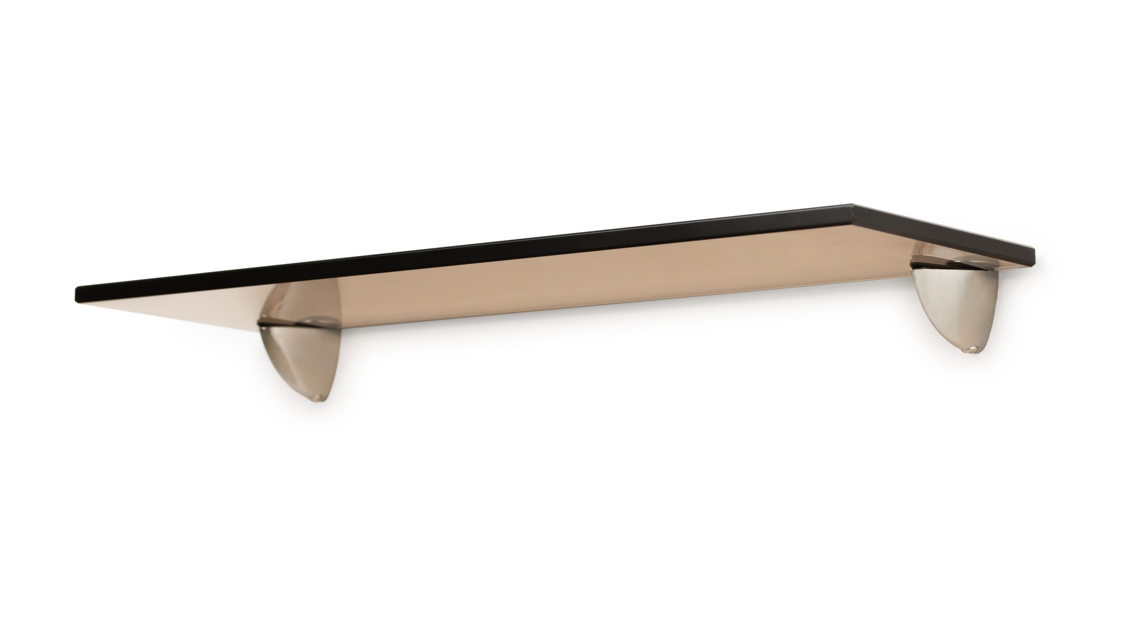 Custom glass shelf with a beveled edge and modern brackets, perfect for showcasing decor in contemporary spaces. Ideal for table tops, mirrors, and shower doors.