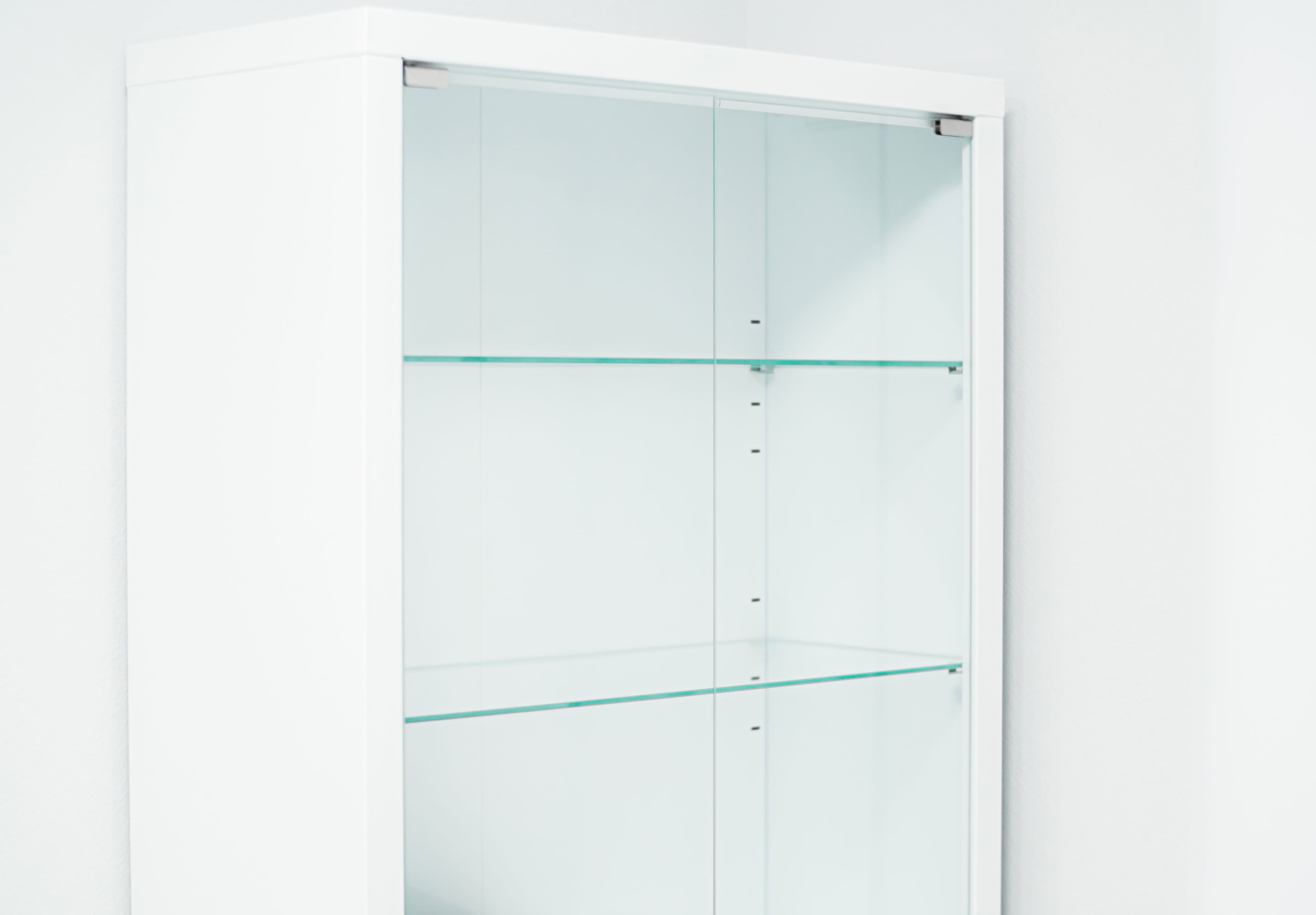 Clear custom glass cabinet with multiple shelves, featuring tempered glass for durability and a sleek design. Perfect for showcasing items with a modern look.