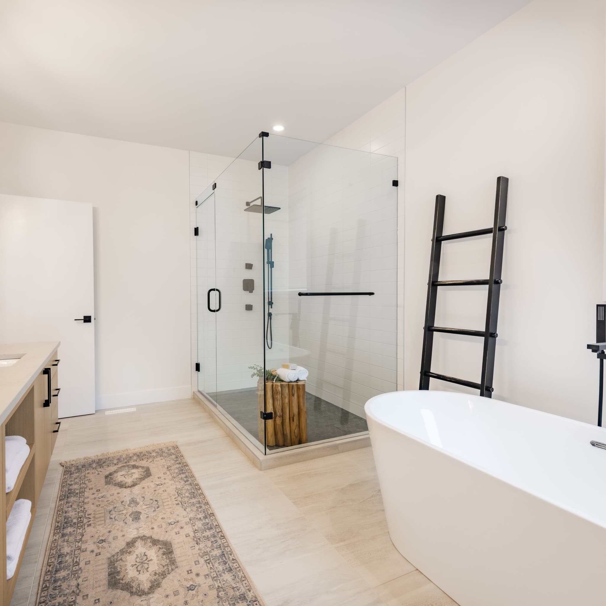 Spacious bathroom with a frameless glass walk-in shower