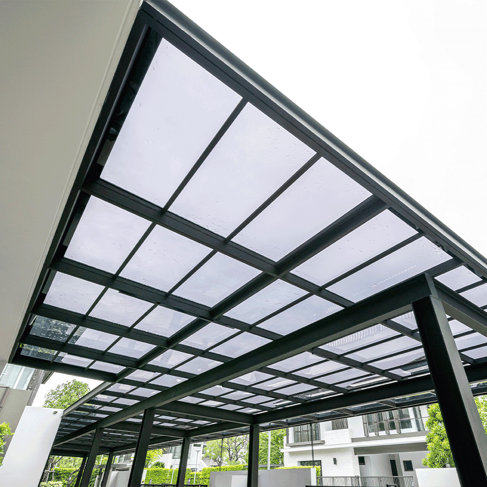Glass pergola roof featuring custom tempered glass panels, highlighting durability and modern design.