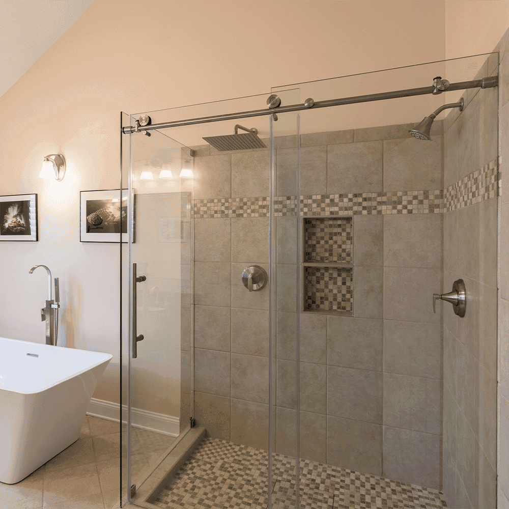 Modern bathroom featuring custom glass shower doors with a sleek design, showcasing tempered glass and a contemporary tile layout, perfect for elevating your space with style.