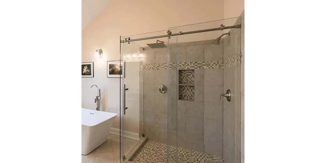 Modern bathroom featuring custom glass shower doors with a sleek design, showcasing tempered glass and a contemporary tile layout, perfect for elevating your space with style.