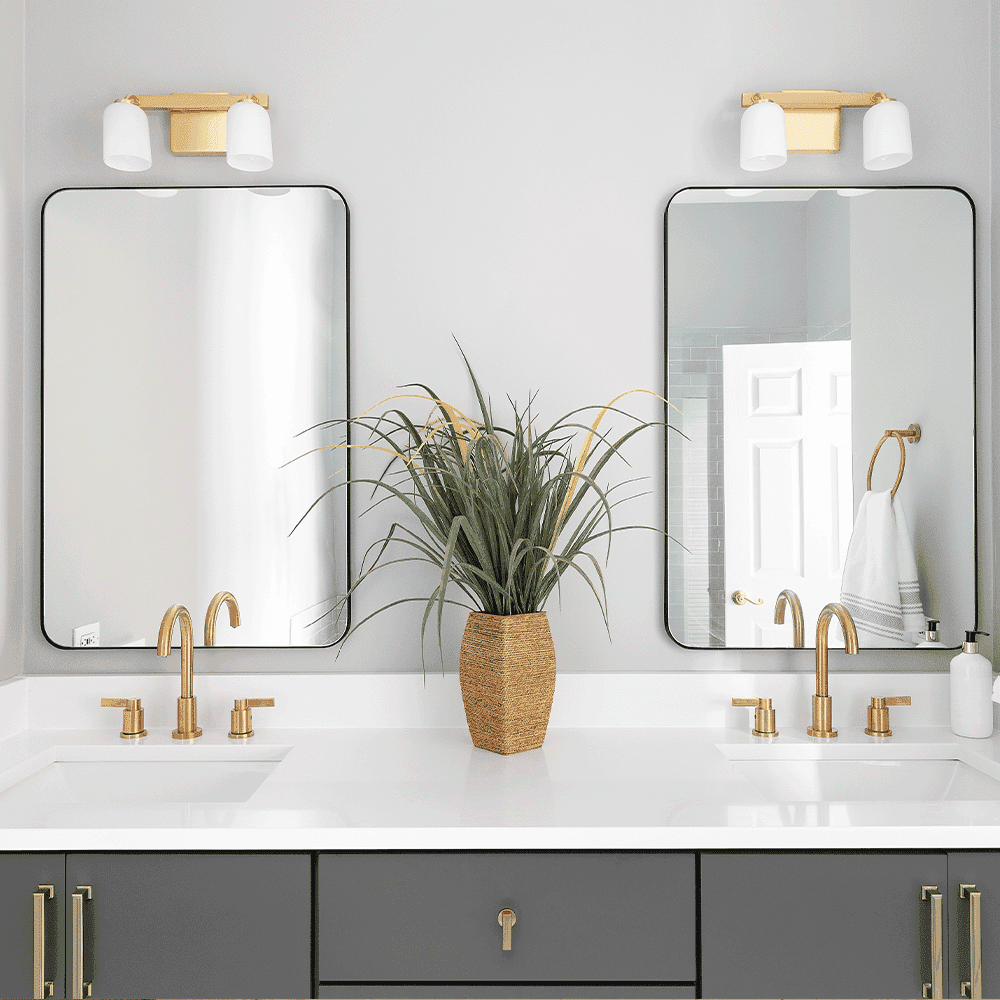 Elegant bathroom featuring custom beveled edge mirrors