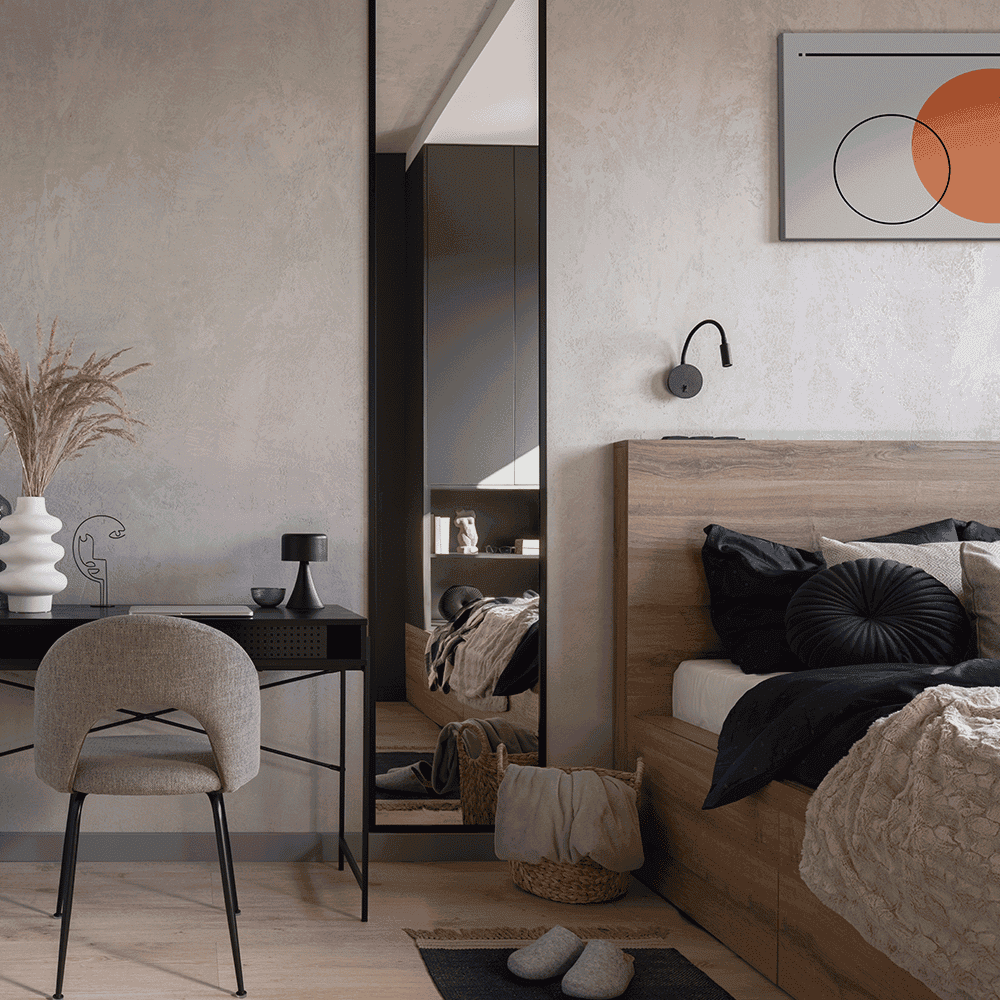 Modern bedroom featuring a sleek custom mirror reflecting stylish decor, complemented by a wooden bed, a desk, and decorative elements. Ideal for inspiration on custom glass applications, including mirrors and bespoke interiors.
