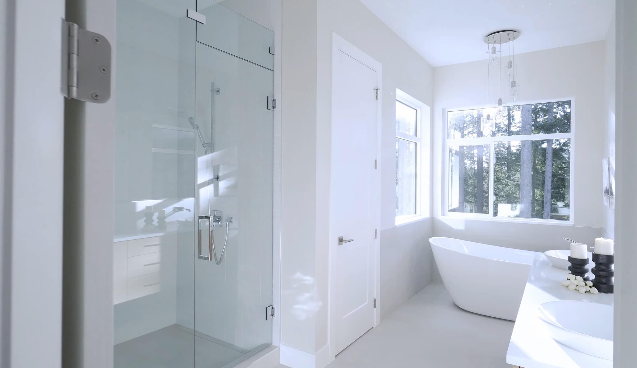 Modern bathroom featuring custom shower doors