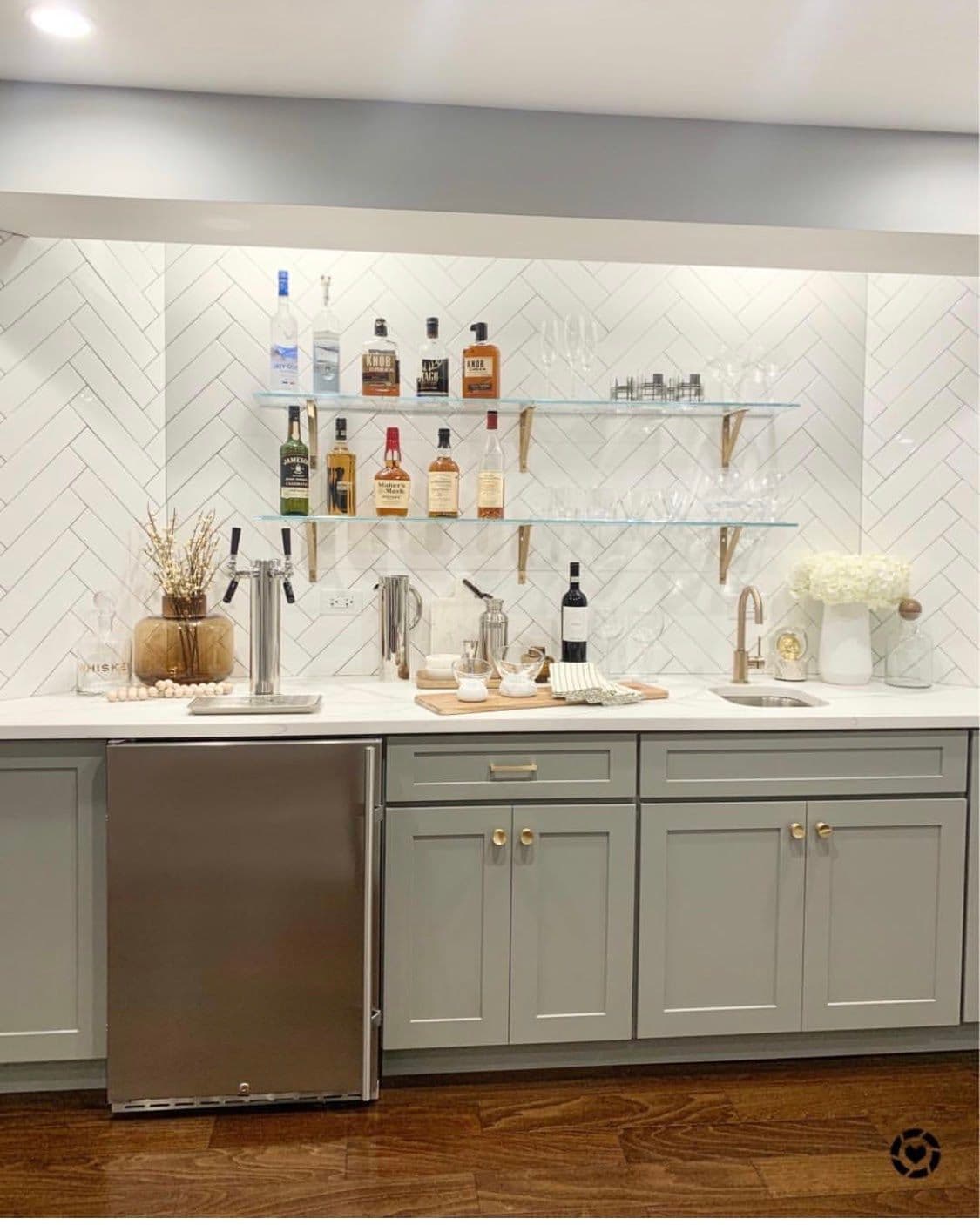 Custom glass shelves and bar area featuring tempered glass, stylish mirrors, and elegant cabinetry, ideal for showcasing shower doors and beveled glass edge designs.