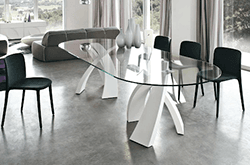 oval-shaped-glass-dining-table-with-white-base.png