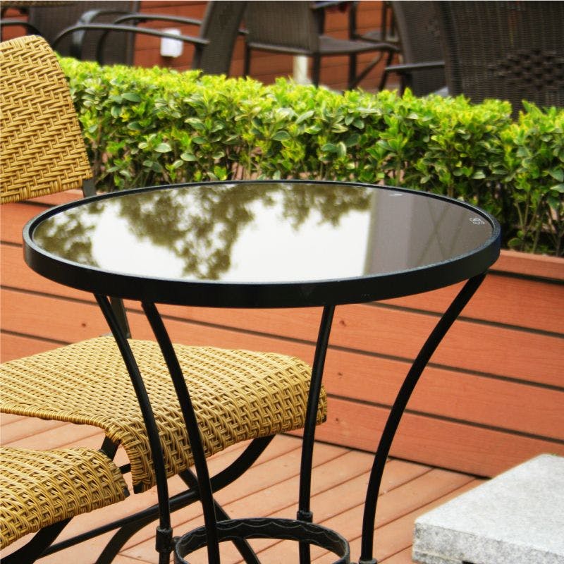 Circular patio table with sleek black metal frame
