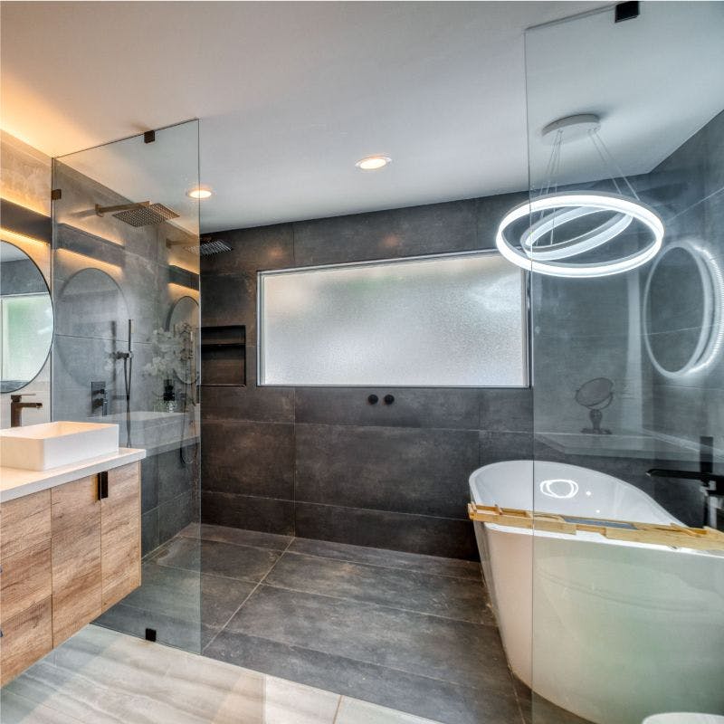 Contemporary bathroom featuring a sleek glass shower door.