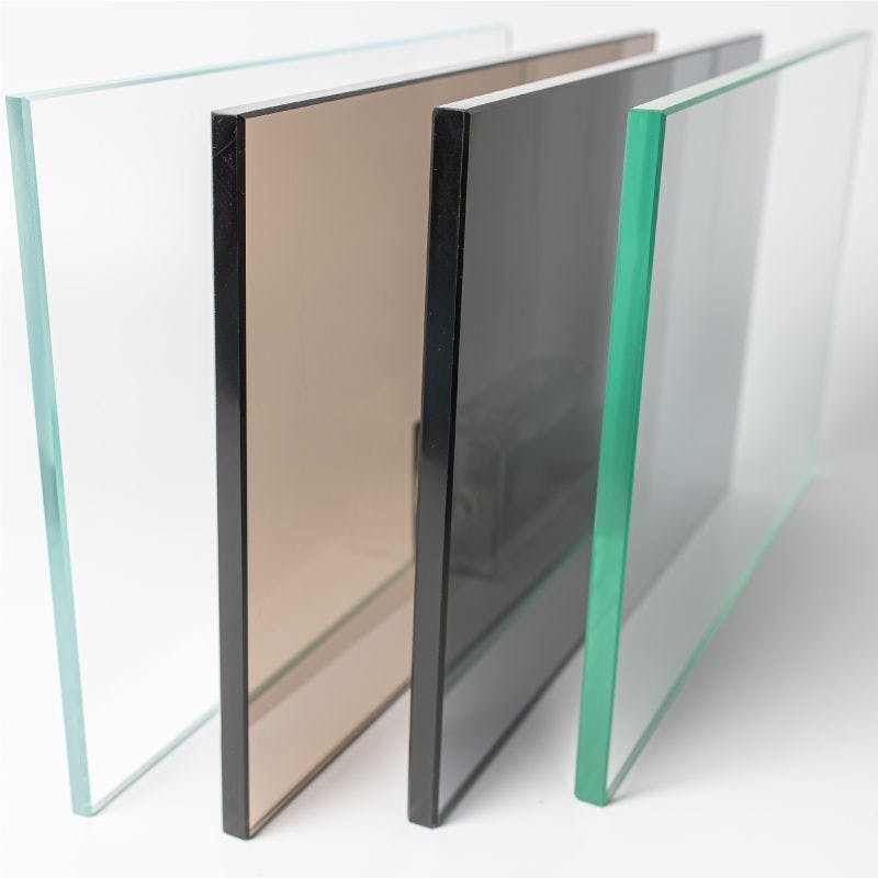 Four glass panels on white surface