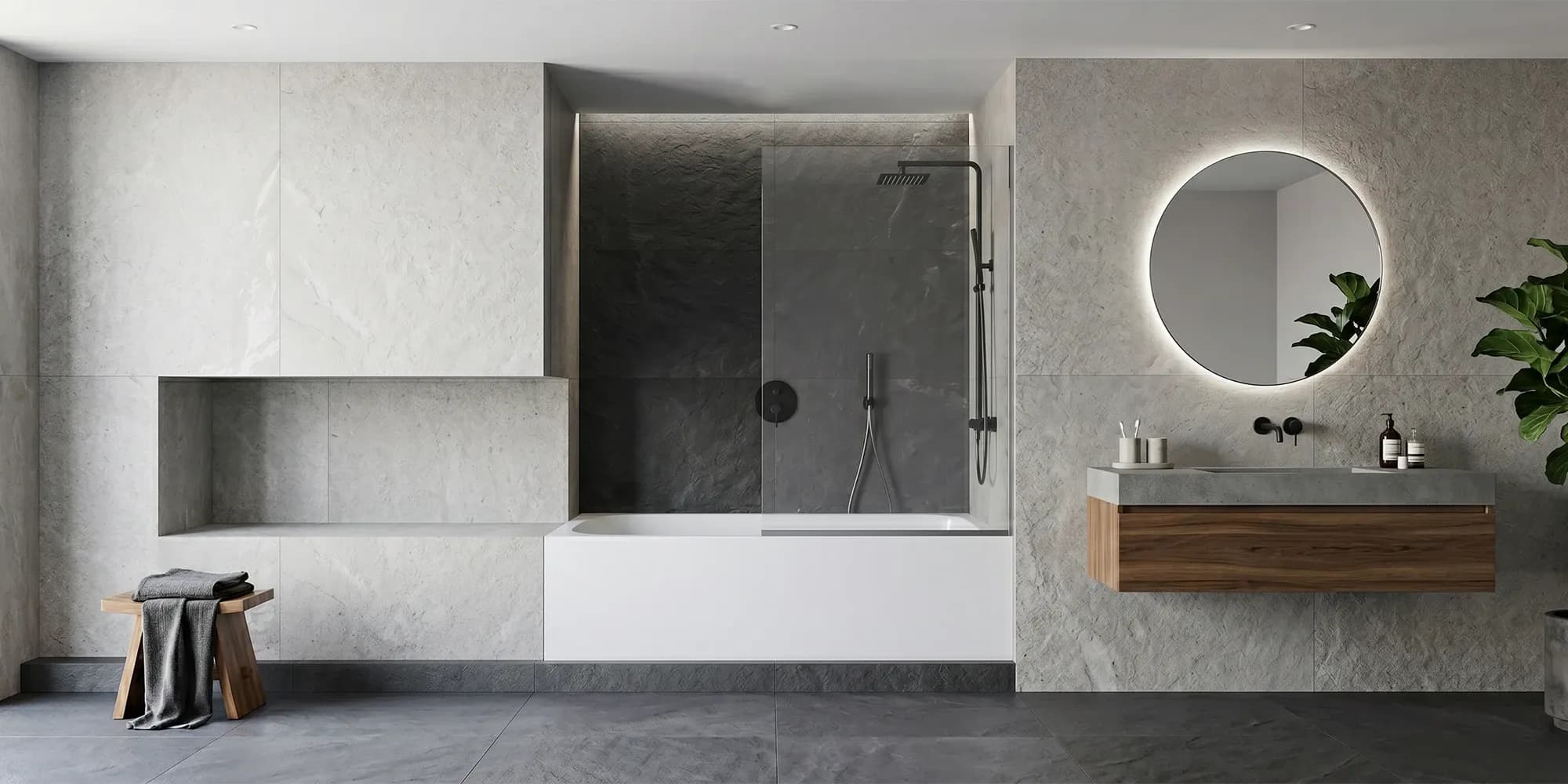 A finished frameless bathtub glass screen installed over a standard alcove tub