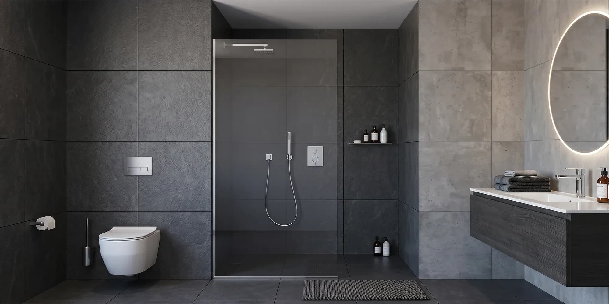 Single frameless fixed shower panel anchored to the wall and threshold, defining a walk-in shower without a door
