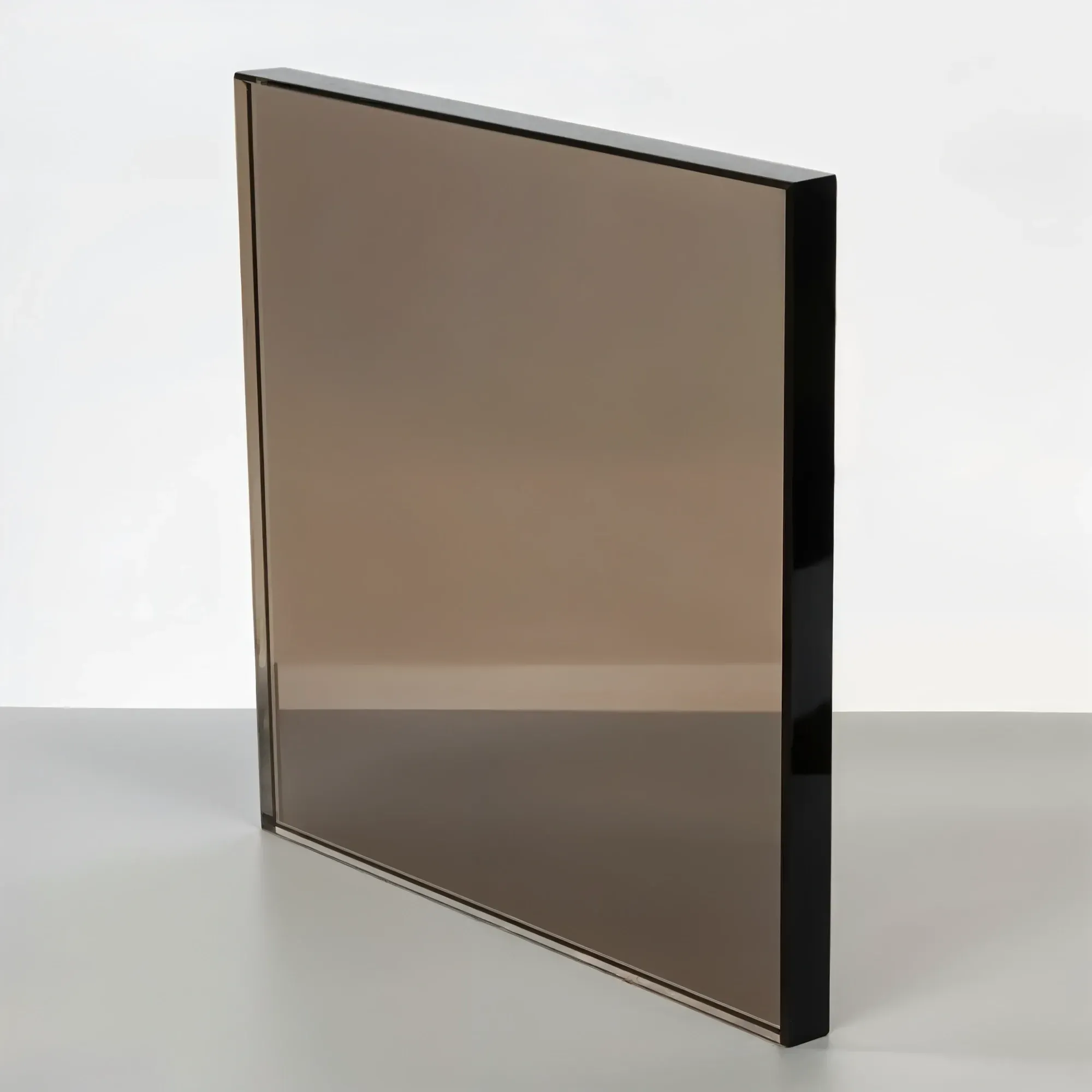 A sample of a rich bronze tinted glass panel, featuring a warm, brown transparent hue and polished, dark edges.