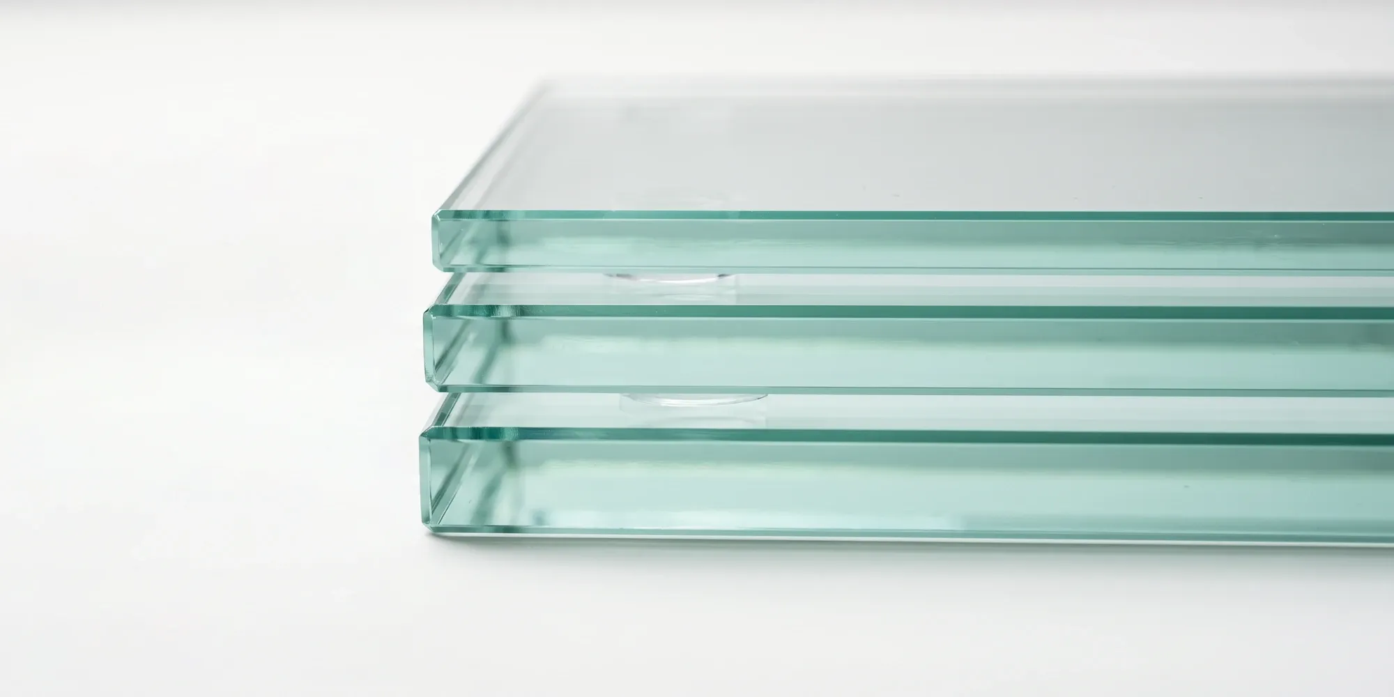 Edge comparison of 1/4-inch, 3/8-inch, and 1/2-inch tempered shower glass shown side by side