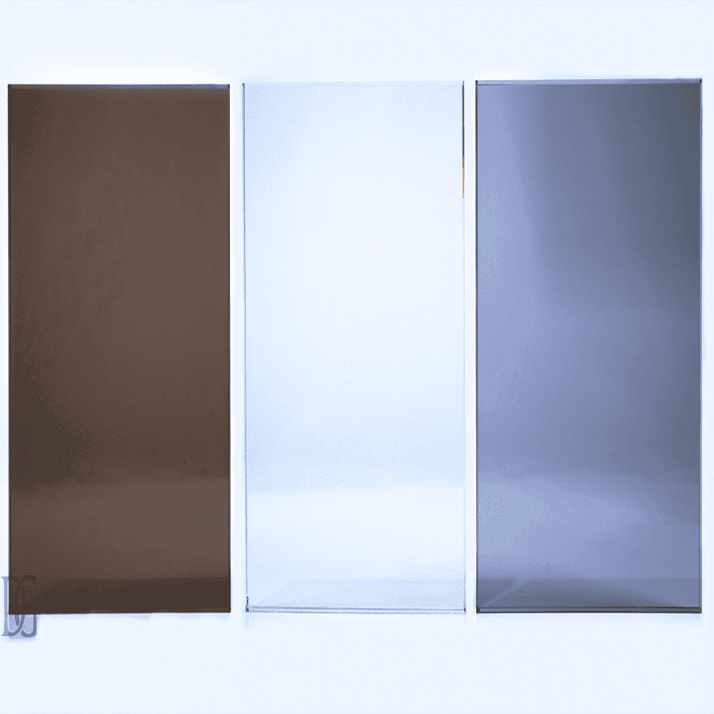 Three samples of custom glass showcasing various finishes: a dark tinted glass, a clear glass, and a smoke glass, ideal for shower doors, table tops, and mirrors, including options for tempered and beveled glass edges.