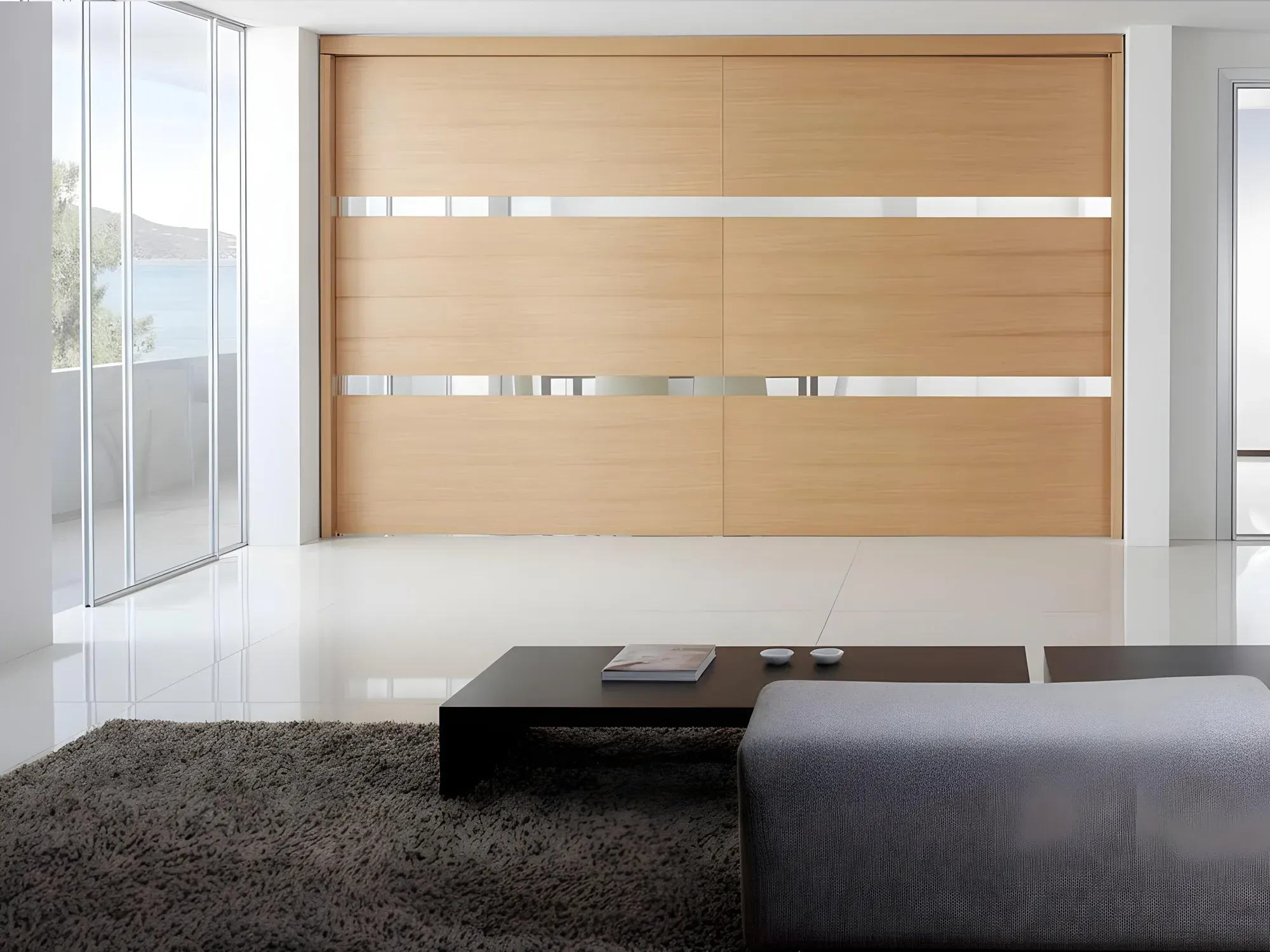 A modern living room with a large, light-wood wardrobe featuring sleek, custom-cut mirror strips across the sliding doors.