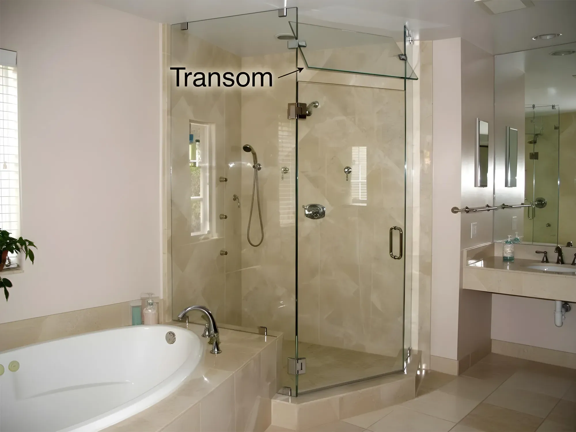 A custom frameless glass steam shower enclosure in a marble bathroom