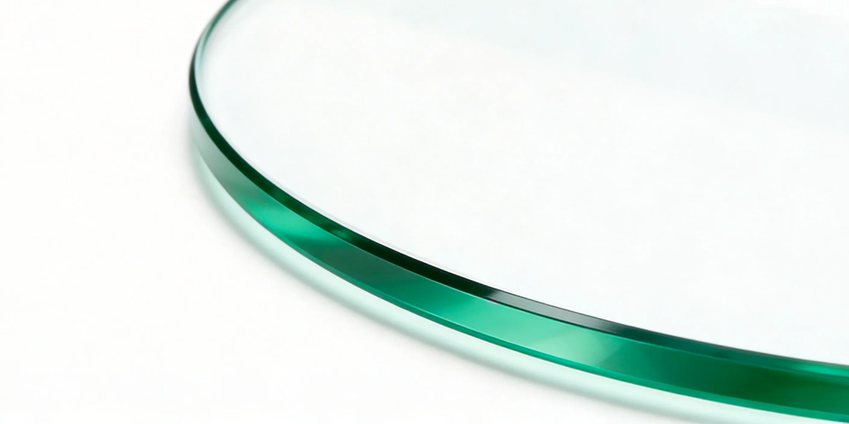 Close-up of a flat polished glass edge — squared, linear finish suited for contemporary furniture