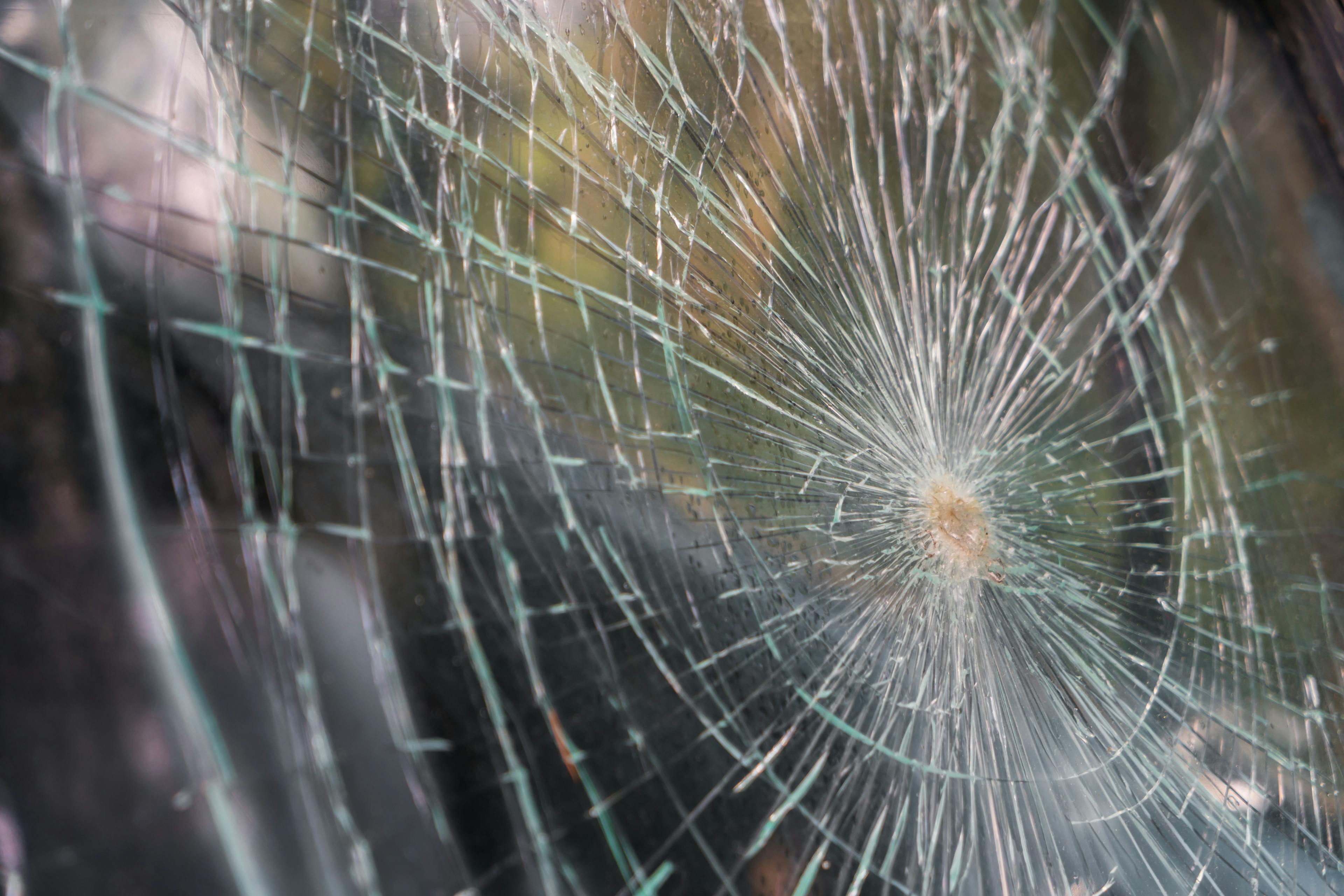 glass-broken-cracks-splinters-front-car-filtered-image