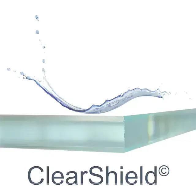 ClearShield« protective coating on custom glass with water splash, showcasing tempered and beveled glass edge features for shower doors, table tops, and mirrors.
