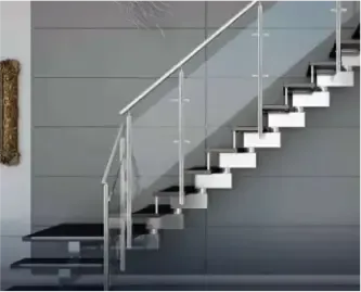 Modern staircase featuring custom glass railings, highlighting the use of tempered glass for safety and aesthetics, complementing the overall contemporary design.