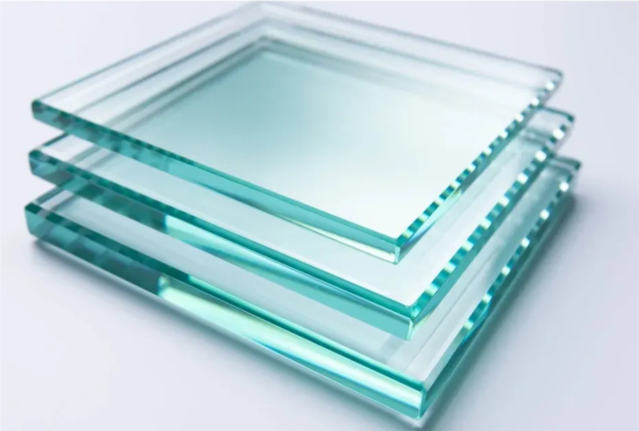 Stack of clear tempered glass panels with beveled edges, ideal for custom glass applications including shower doors, table tops, and mirrors.