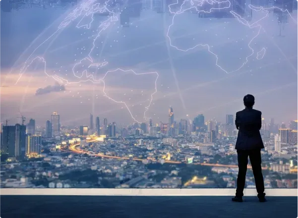 Business professional looking out over a city skyline with a digital globe, symbolizing innovation in custom glass solutions like shower doors, table tops, mirrors, tempered glass, and beveled glass edges.