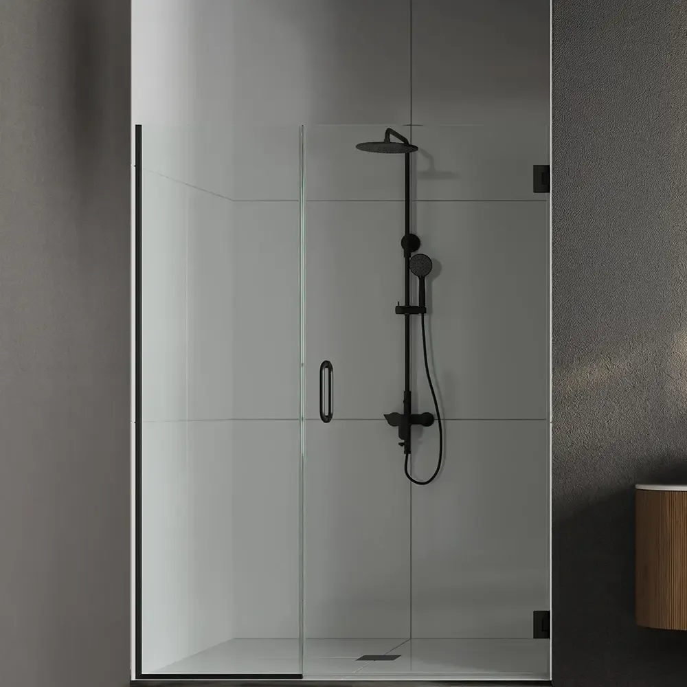 A modern bathroom featuring a walk-in glass shower with a black base, large grey stone wall tiles, a floating wood vanity with a white countertop, and a freestanding white soaking tub.